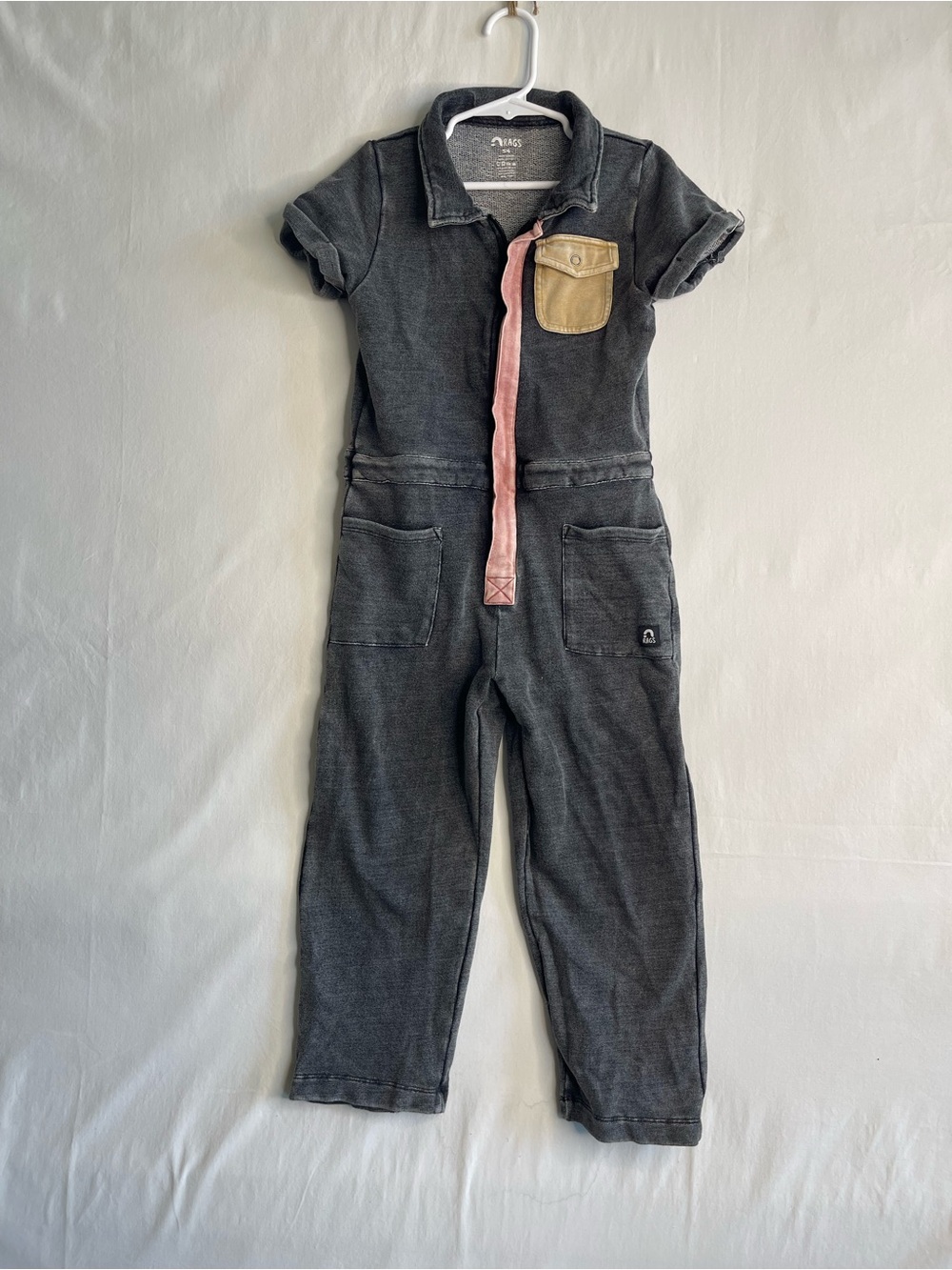Rags to Raches Charcoal One-Piece Bodysuit with‎ Pink Zip and Tan Pocket